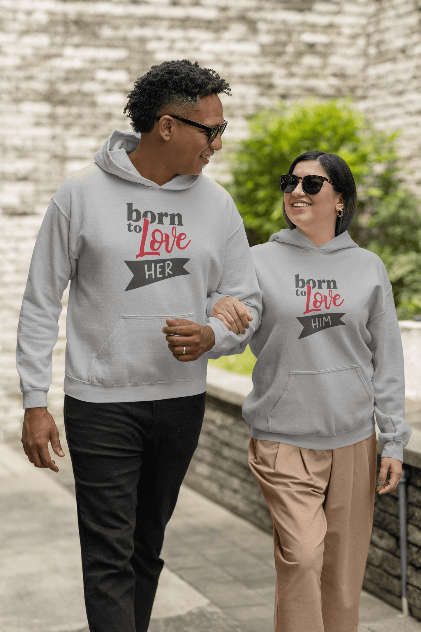 Couple wearing Born to Love Hoodie Set; cozy and stylish gray hoodies for him and her, perfect for everyday elegance.