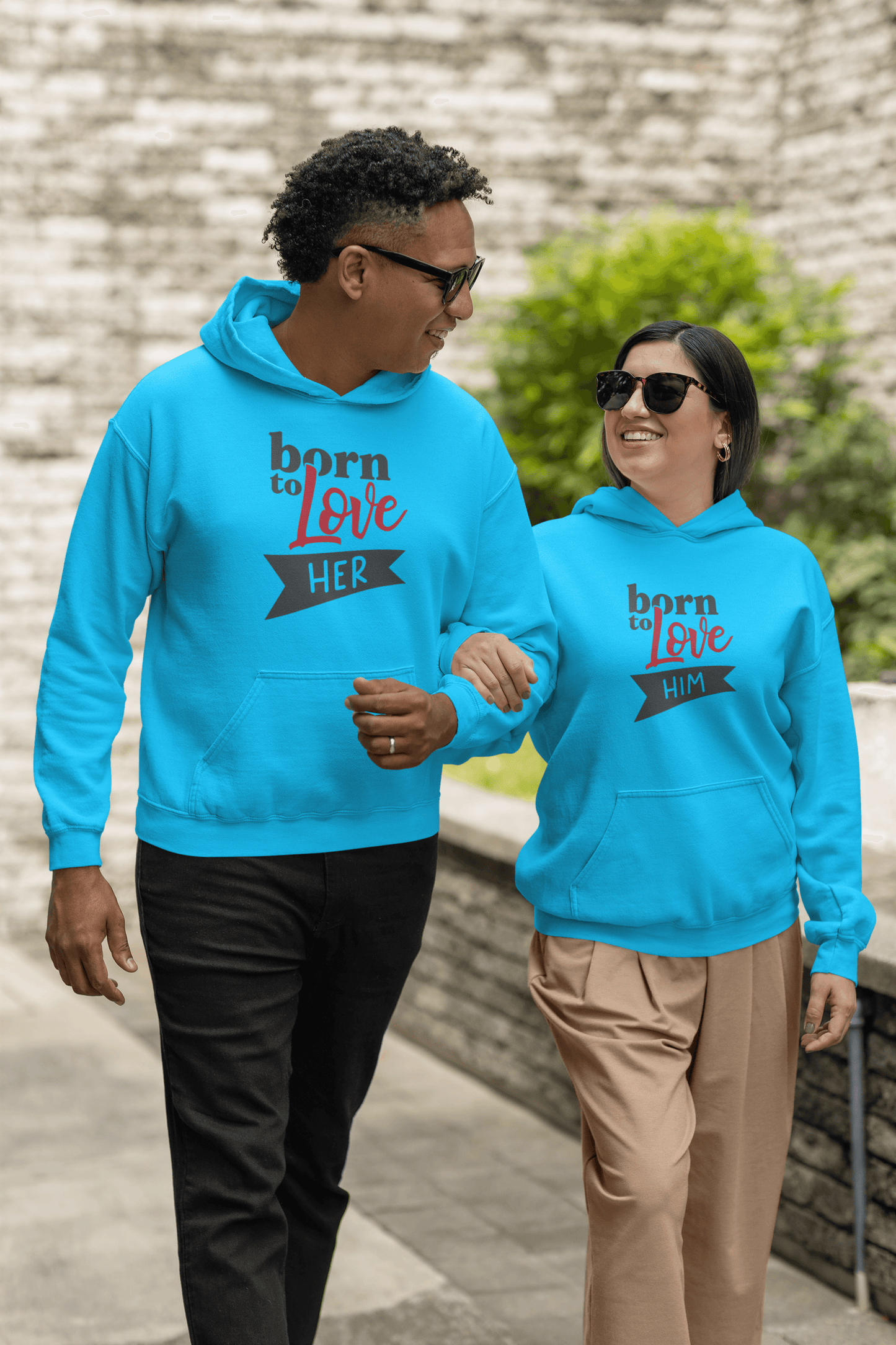 Couple wearing Born to Love Hoodie Set in bright blue, showcasing cozy style and elegance for any occasion.